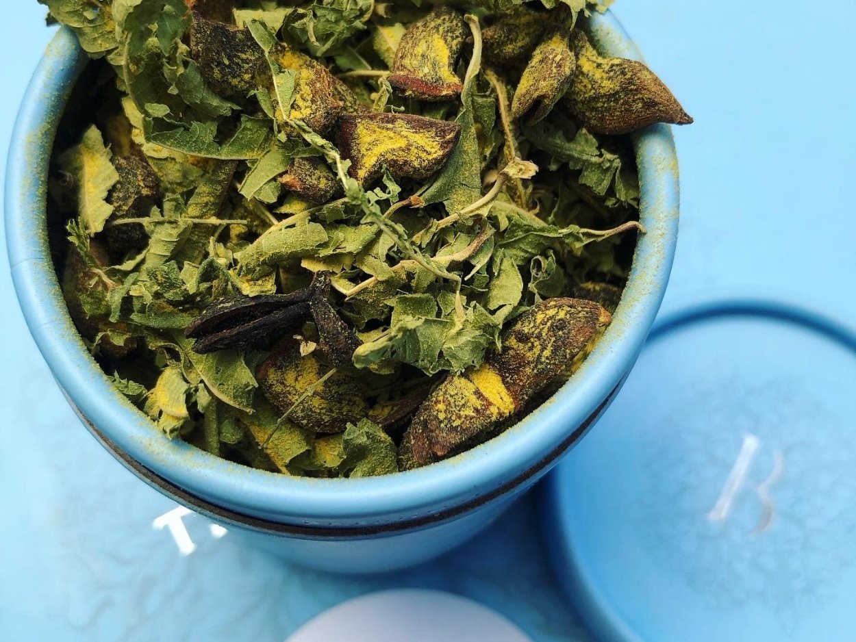 Tin of Blue House Tea turmeric ginger and star anise loose leaf herbal tea