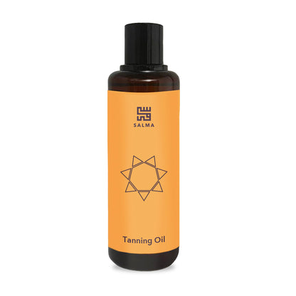 Bottle of Salma Loves Beauty tanning oil for shimmer and hydration