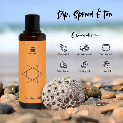 Bottle of Salma Loves Beauty tanning oil for shimmer and hydration