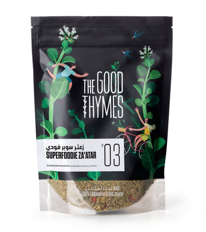 Jar of Superfoodie zaatar with goji berries pumpkin seeds chia and flax